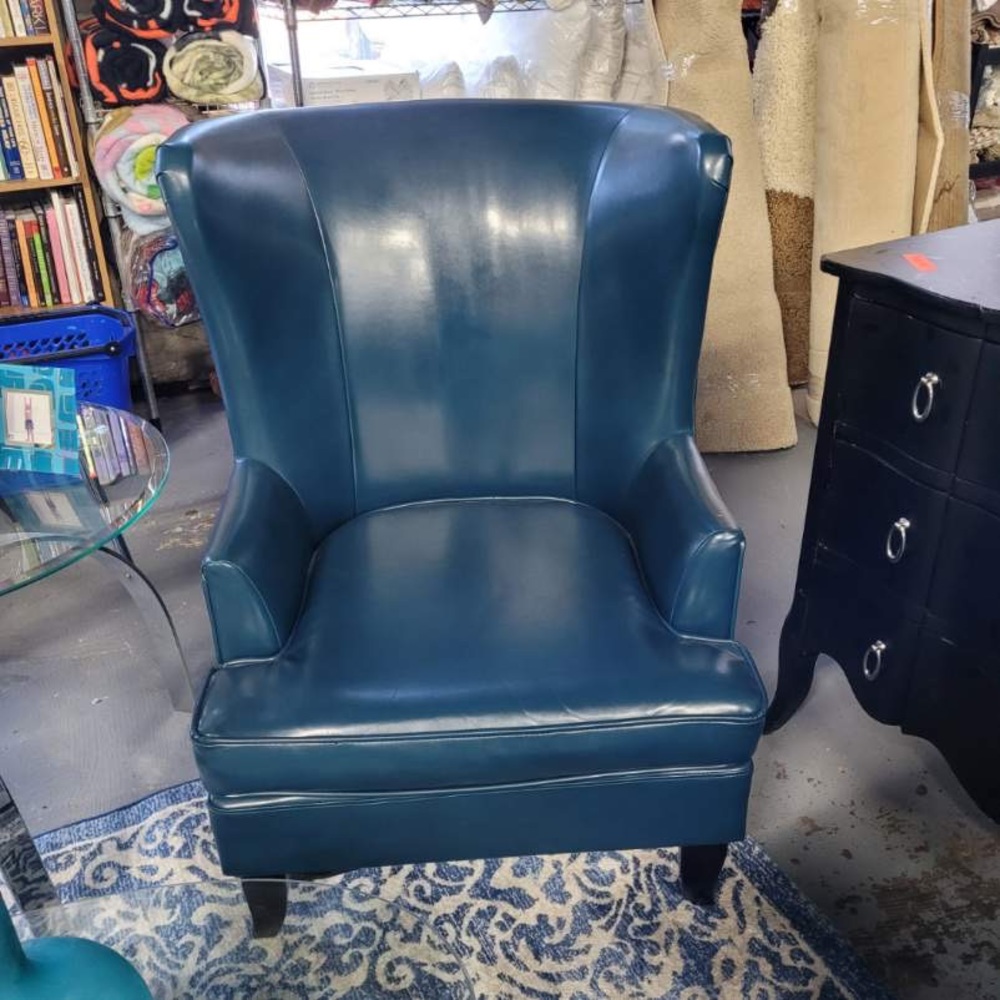 Like new wing back blue chairs only used for staging properties in rentals